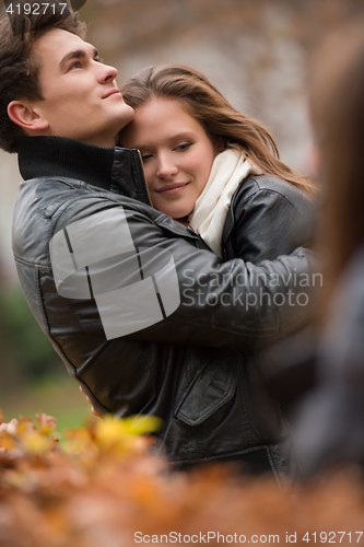 Image of Autumn portrait of attractive happy couple