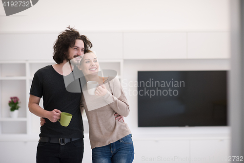 Image of Happy couple in their new home