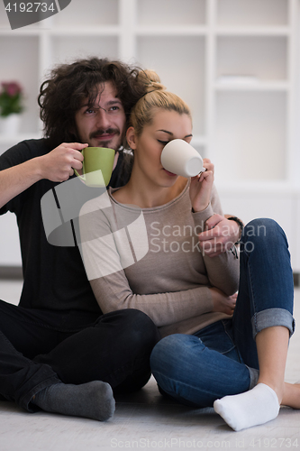 Image of young couple in their new home