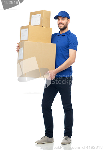 Image of happy delivery man with parcel boxes