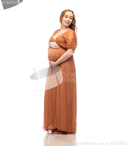 Image of happy pregnant woman touching her big belly