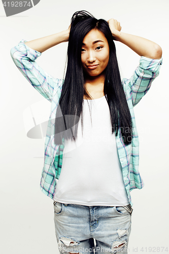 Image of young pretty asian woman posing cheerful emotional isolated on white background, lifestyle people concept