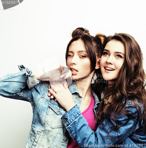 Image of best friends teenage girls together having fun, posing emotional on white background, besties happy smiling, lifestyle people concept close up