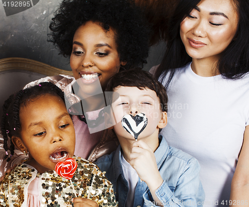 Image of Lifestyle and people concept: young pretty diversity nations woman with different age children celebrating on birth day party together happy smiling, making selfie. African-american, asian and caucasi