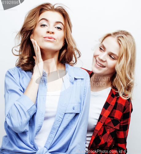 Image of best friends teenage girls together having fun, posing emotional on white background, besties happy smiling, lifestyle people concept close up