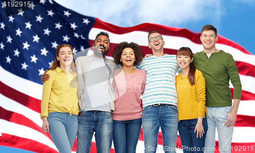 Image of international group of people over american flag