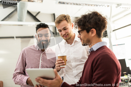 Image of business team with tablet pc and coffee at office