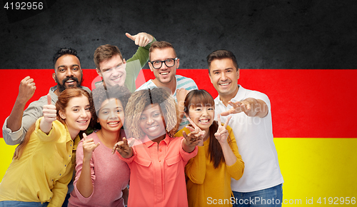 Image of international people gesturing over german flag