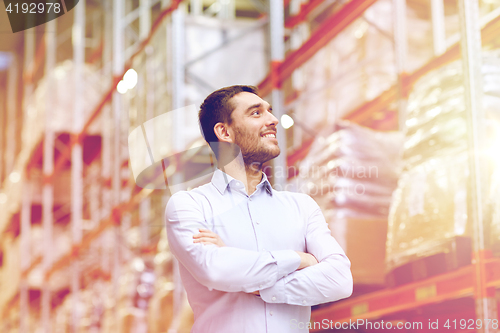 Image of happy man at warehouse