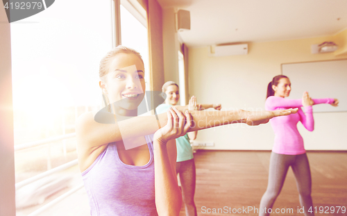 Image of group of women working out in gym