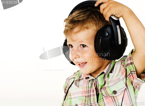 Image of young pretty little cute boy kid wondering, posing emotional face isolated on white background, gesture happy smiling close up, wearing headphones, lifestyle people concept
