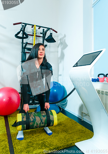 Image of The female athlete doing they exercise in a ems fitness studio