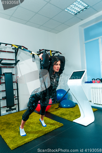 Image of The female athlete doing they exercise in a ems fitness studio