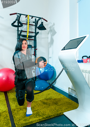 Image of The female athlete doing they exercise in a ems fitness studio