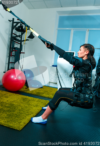 Image of The female athlete doing they exercise in a ems fitness studio