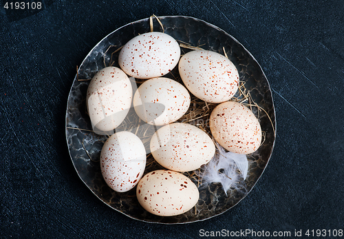 Image of raw chicken eggs