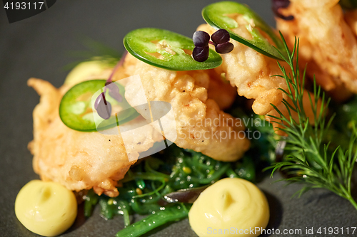 Image of close up of prawn salad with jalapeno and wakame