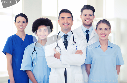 Image of group of happy doctors at hospital