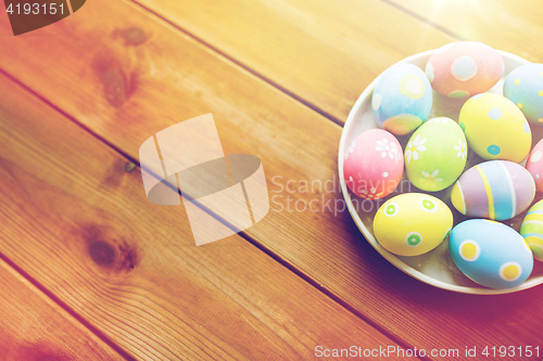 Image of close up of colored easter eggs on plate