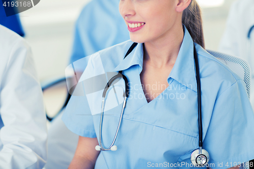 Image of close up of doctor with stethoscope at seminar