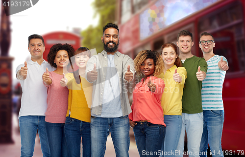 Image of international people showing thumbs up at london