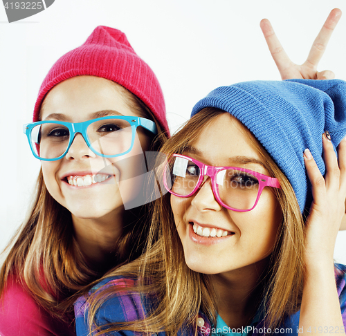 Image of best friends teenage girls together having fun, posing emotional on white background, besties happy smiling, lifestyle people concept close up