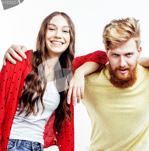 Image of young pretty teenage couple, hipster guy with his girlfriend happy smiling and hugging isolated on white background, lifestyle people concept 