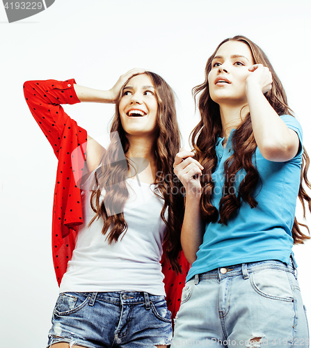 Image of best friends teenage girls together having fun, posing emotional on white background, besties happy smiling, lifestyle people concept close up