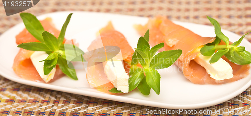 Image of appetizers with red fish