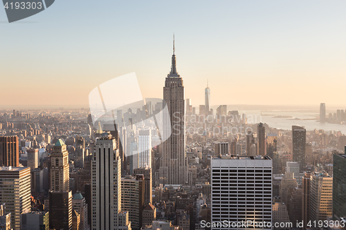 Image of New York City Manhattan downtown skyline at sunset.