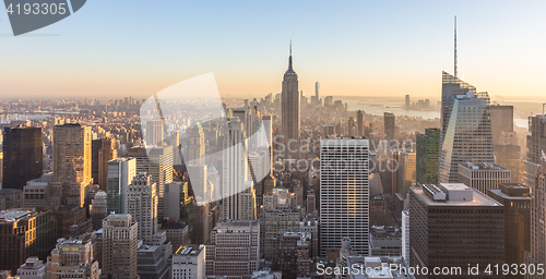 Image of New York City Manhattan downtown skyline at sunset.