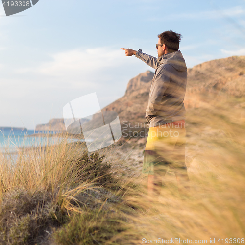 Image of Free active man enjoying beauty of nature.