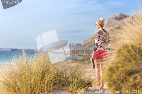 Image of Free Happy Woman Enjoying Sun on Vacations.