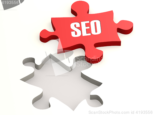 Image of Red jigsaw puzzle with SEO word