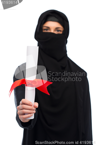 Image of muslim woman in hijab with diploma over white