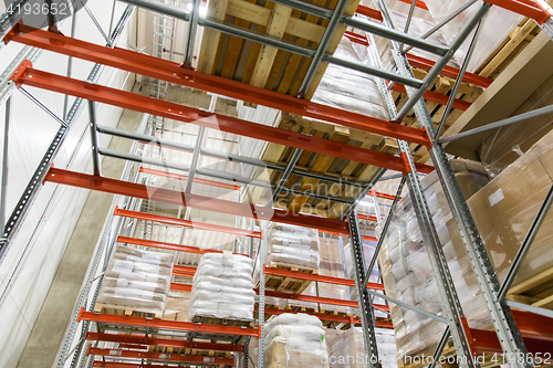 Image of cargo boxes storing at warehouse shelves