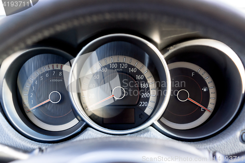 Image of Car dashboard with round wells