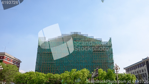 Image of Construction of skyscrapers under blue sky