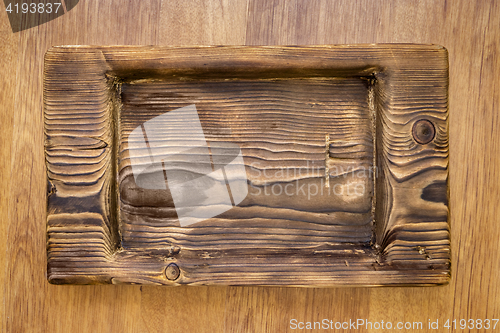 Image of Coarse rustic wooden plate