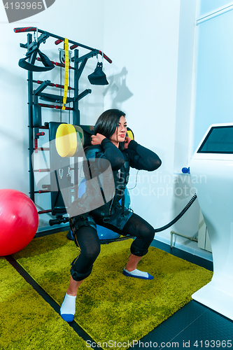 Image of The female athlete doing they exercise in a ems fitness studio