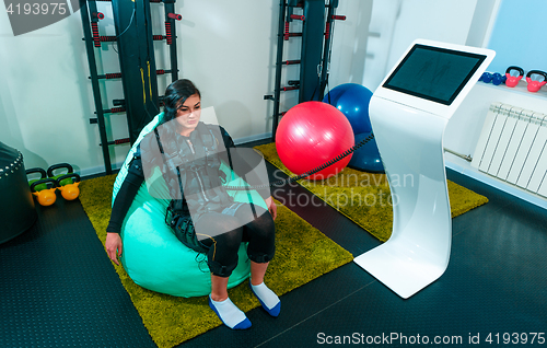 Image of The female athlete doing they exercise in a ems fitness studio