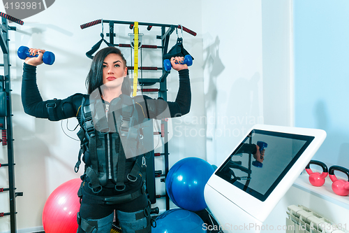 Image of The female athlete doing they exercise in a ems fitness studio