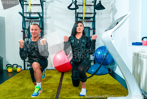 Image of The female athlete doing they exercise in a ems fitness studio