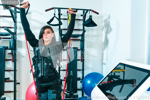 Image of The female athlete doing they exercise in a ems fitness studio