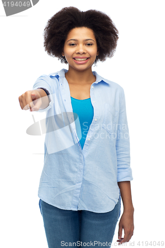 Image of happy african woman pointing finger to you