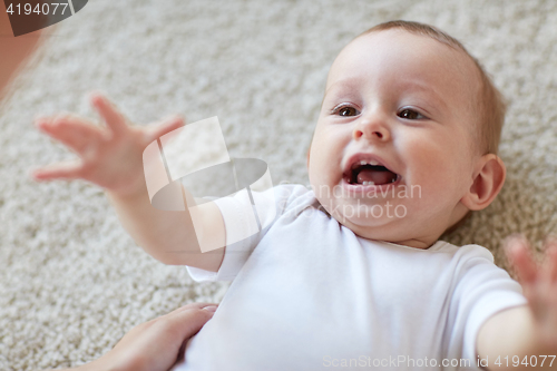 Image of close up of happy little baby and mother