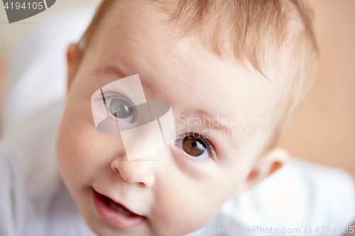 Image of close up of happy little baby boy or girl face