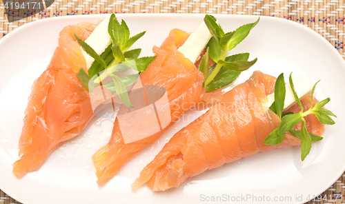 Image of appetizers with red fish