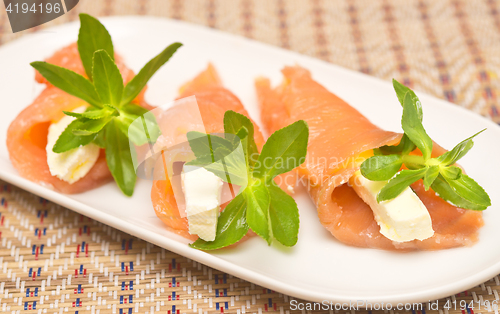 Image of appetizers with red fish