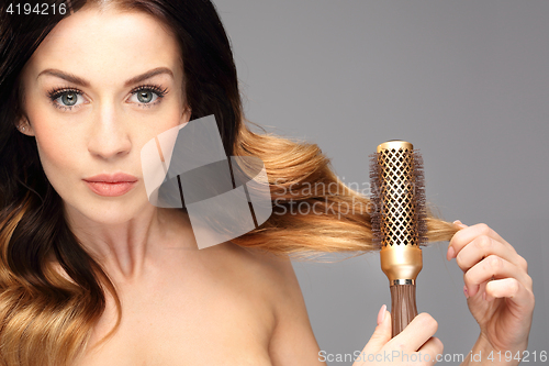 Image of Modeling hair. Modeling hair brush.